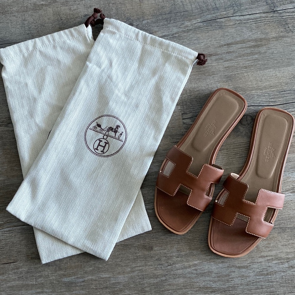 Hermes Oran gold piqûres écrues